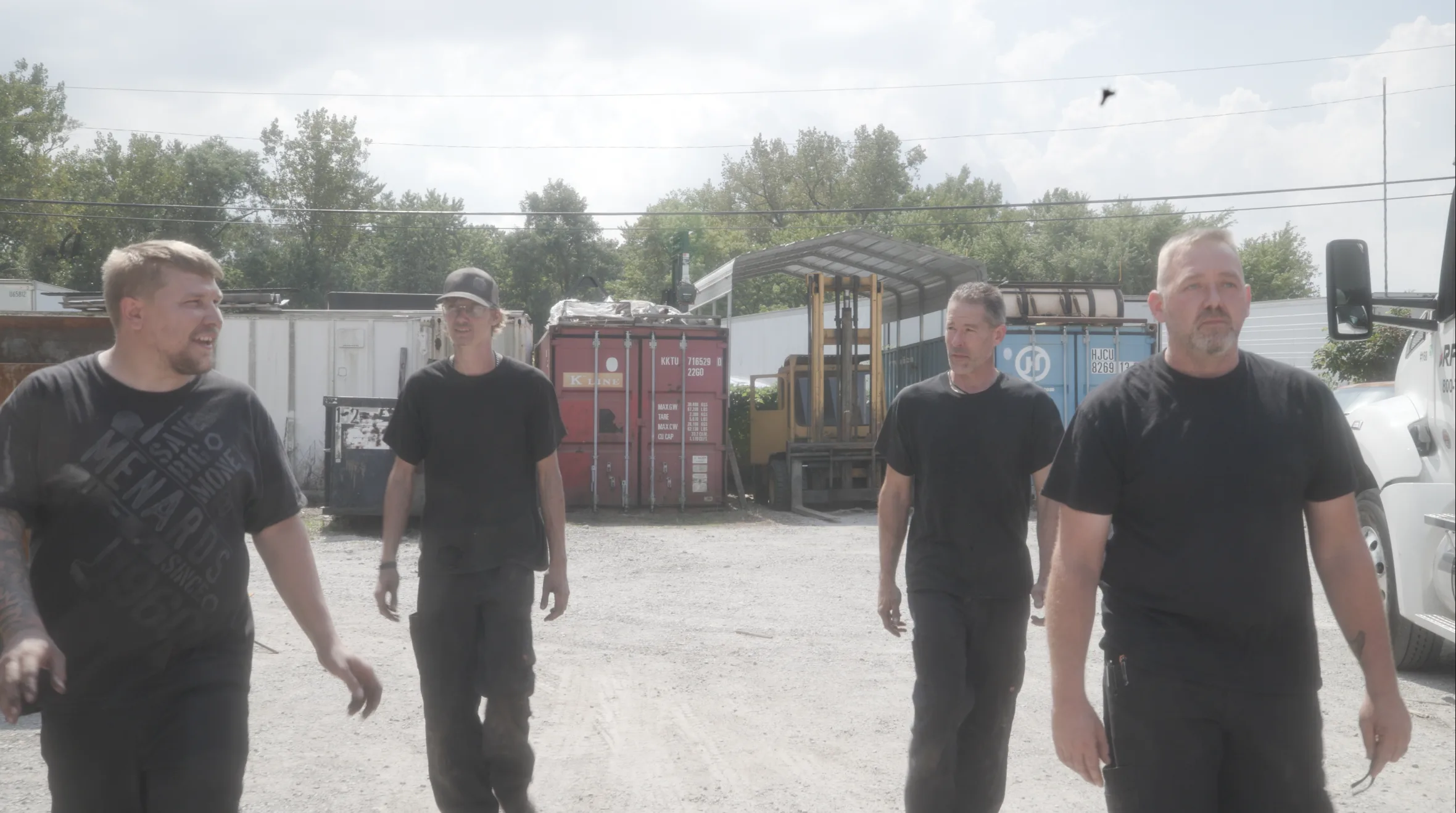 Precision Truck Equipment team outside the shop